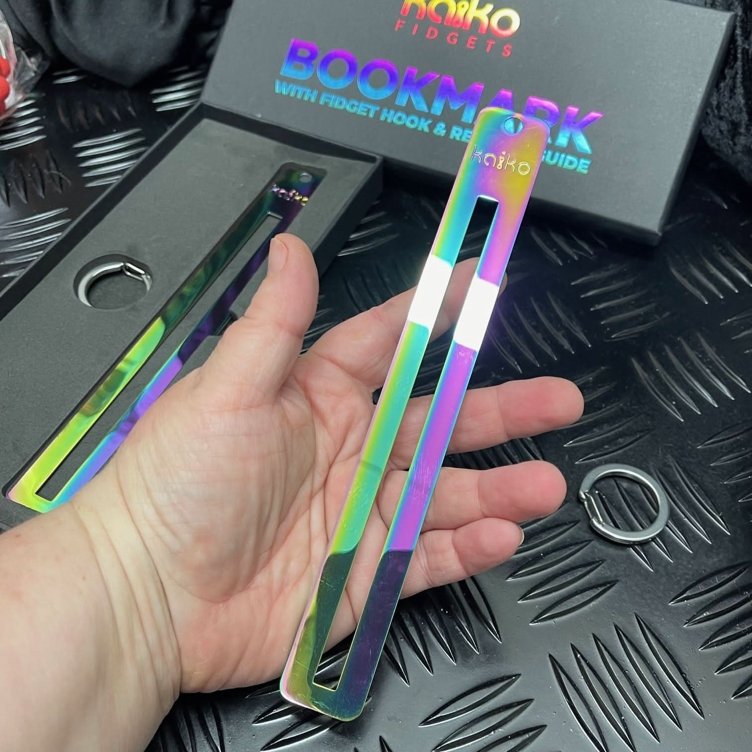 Kaiko Fidgets metal bookmark in oil slick finish with reading guide pane and fidget hook for sensory focus aid - view 10