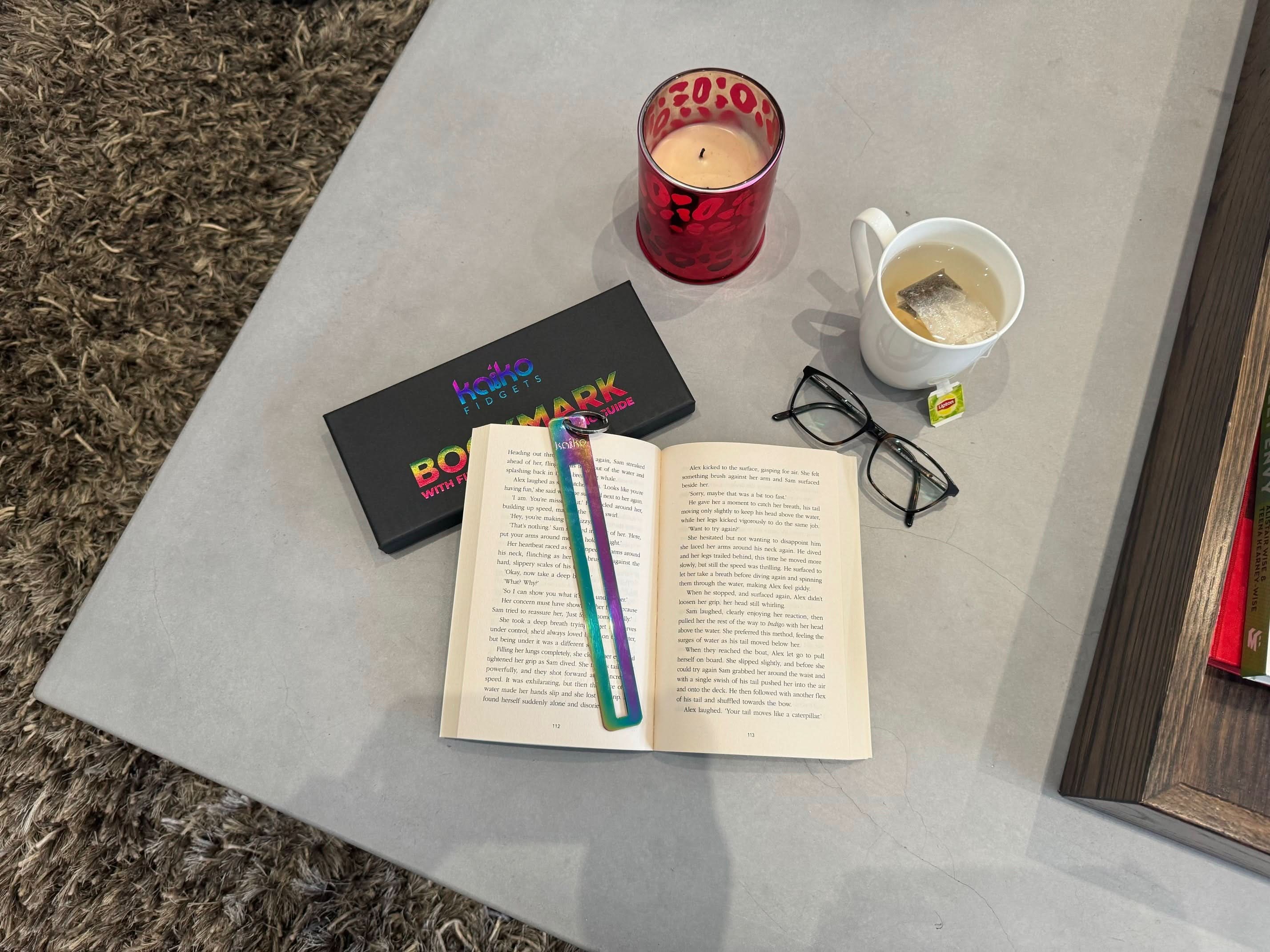 Kaiko Fidgets metal bookmark in oil slick finish with reading guide pane and fidget hook for sensory focus aid - view 12