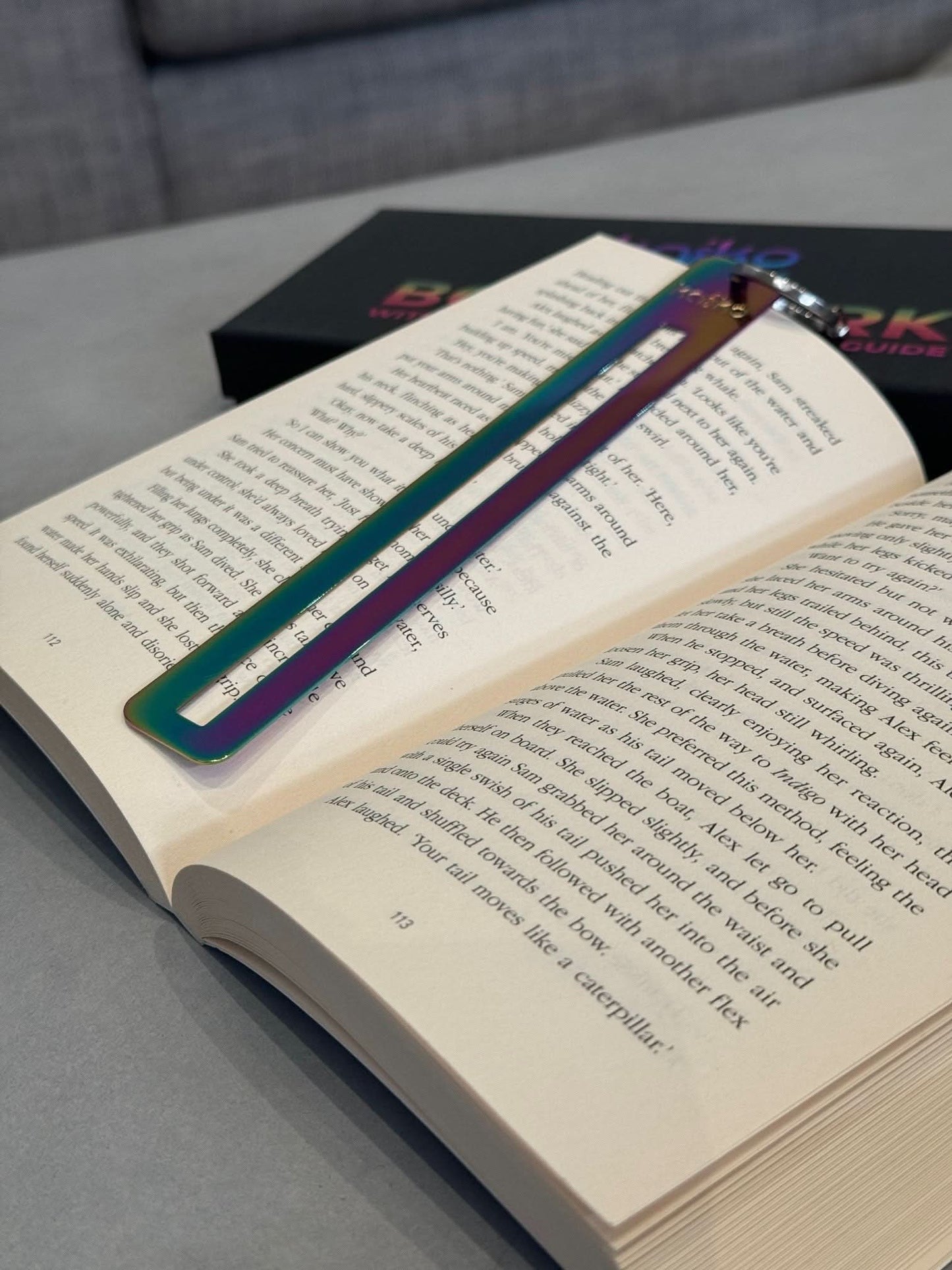 Kaiko Fidgets metal bookmark in oil slick finish with reading guide pane and fidget hook for sensory focus aid - view 14