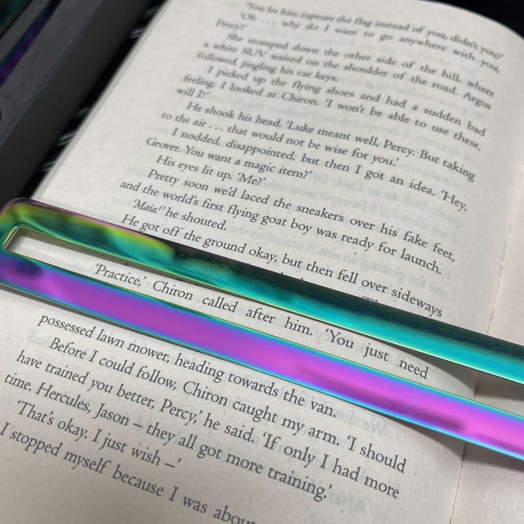 Kaiko Fidgets metal bookmark in oil slick finish with reading guide pane and fidget hook for sensory focus aid - view 2