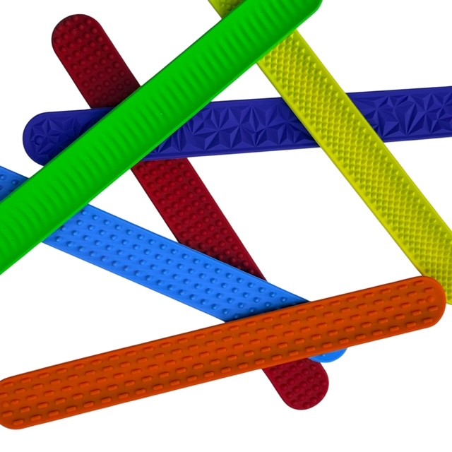 Kaiko Fidgets vibrant silicone sensory slap bands in six textured patterns worn on wrist for tactile sensory support - view 8