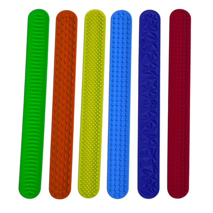 Kaiko Fidgets vibrant silicone sensory slap bands in six textured patterns worn on wrist for tactile sensory support - view 7