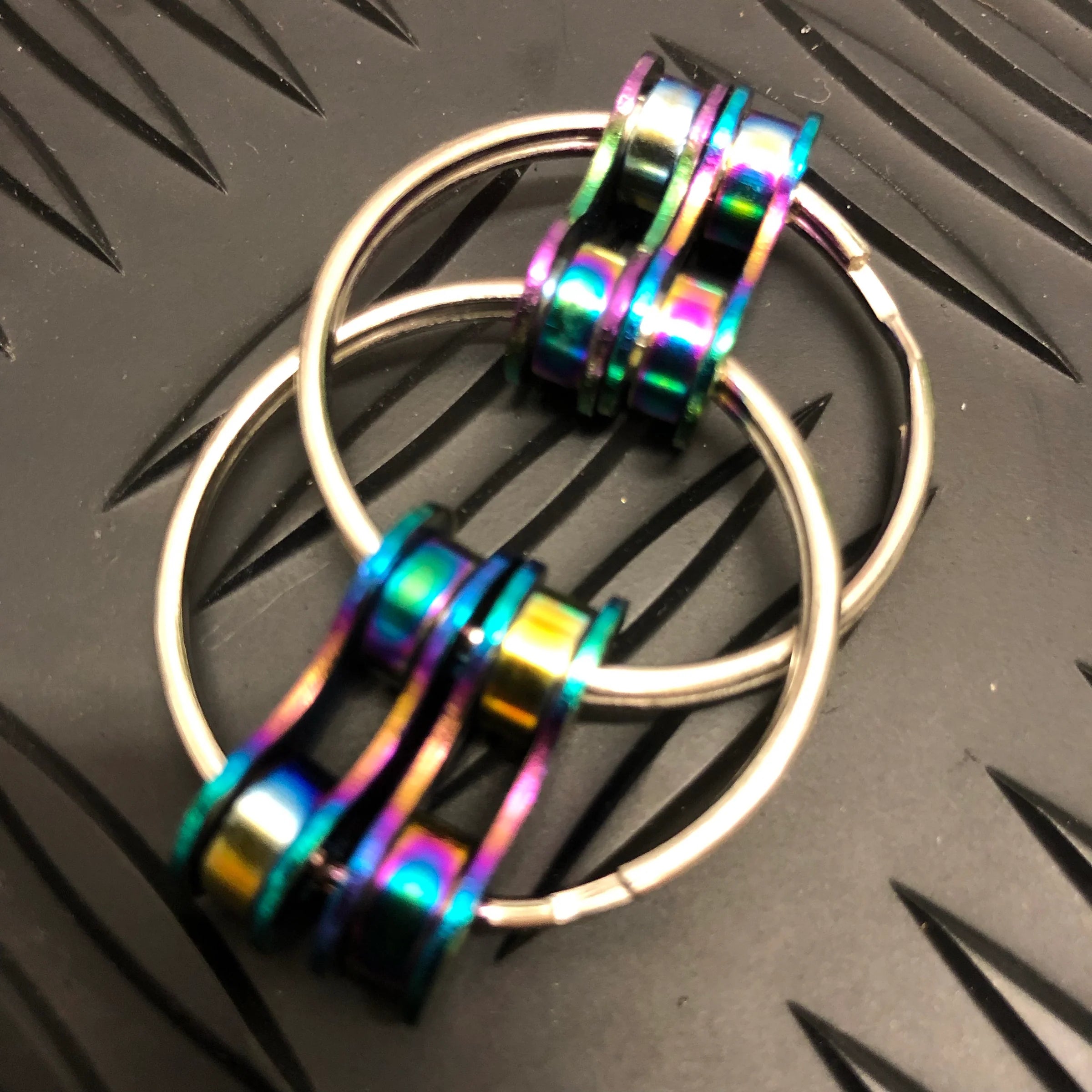 Kaiko Loop Fidget Double Link in Oil Slick Large size showing colorful chain-style sensory toy