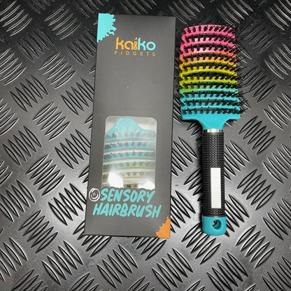 Kaiko Sensory Hairbrush with rainbow design providing soothing tactile stimulation for kids